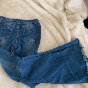 One of a kind vintage heart back pocket jeans